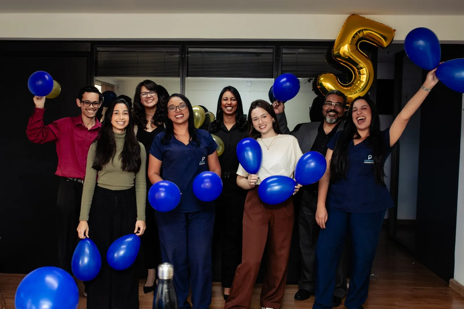 Equipe da Personal Human Care reunida no escritório